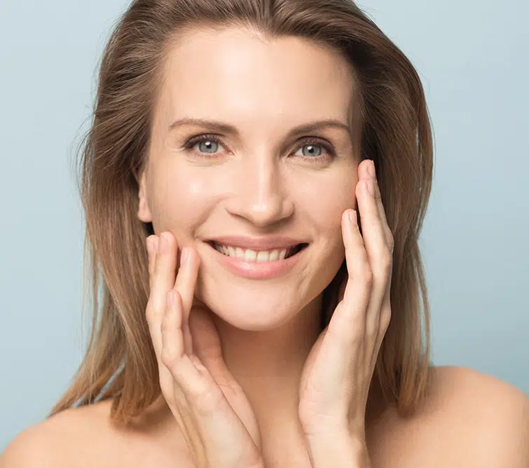 Woman looking in mirror